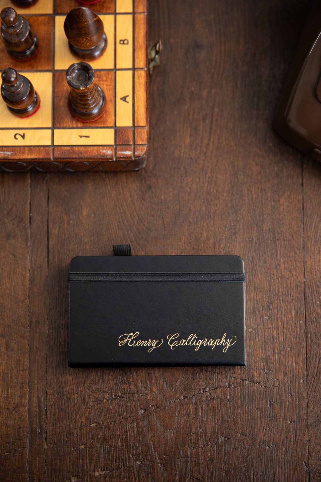 Personalised black notebook with Henry Calligraphy embossed in gold